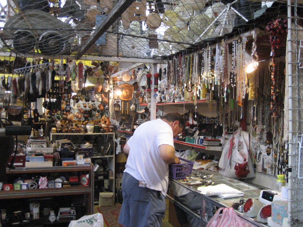 the flea market, where the propretors are constantly rearranging the display of their wares